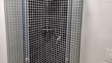 Double Room, City View | Bathroom | Shower, hair dryer, slippers, soap