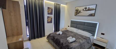 Double Room, City View | Desk, soundproofing, iron/ironing board, bed sheets