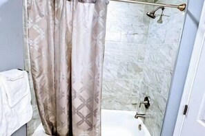 Shower, jetted tub, bidet, towels