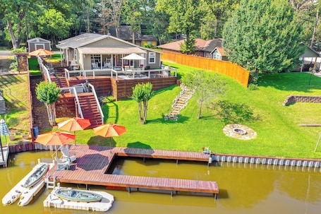 Exterior. Tranquil Lakefront Getaway w/boat dock, kayaks and firepit.