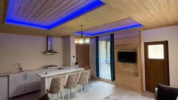 Family Condo | Living area | 102-inch Smart TV with satellite channels, printers