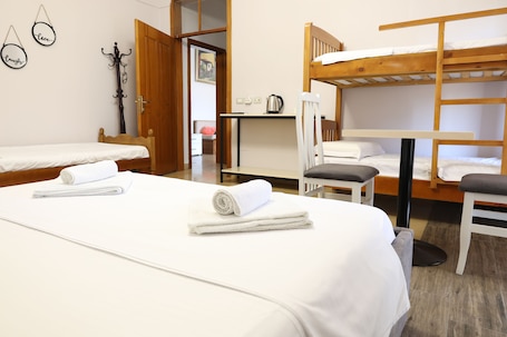 Family Room | Laptop workspace, free WiFi, bed sheets