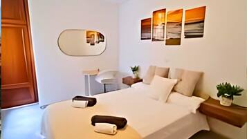 3 slaapkamers, een strijkplank/strijkijzer, gratis wifi, beddengoed