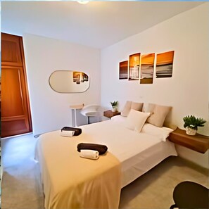 3 habitaciones, tabla de planchar con plancha y wifi gratis