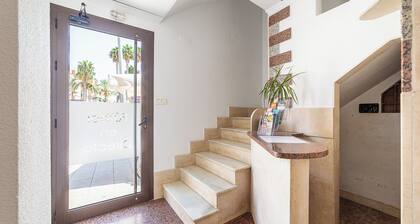 Room 'Habitación Triple' with Wi-Fi and Air Conditioning