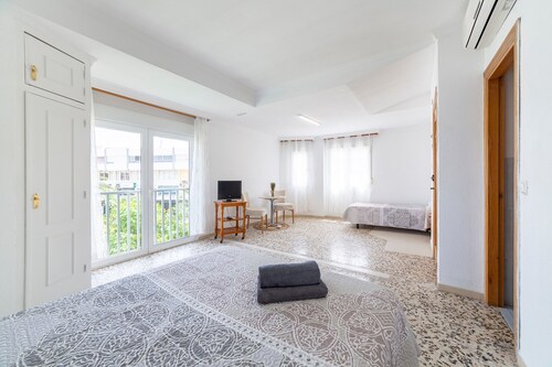Room 'Habitación Triple 2' with Wi-Fi and Air Conditioning