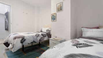 2 quartos, ferros/tábuas de passar roupa, Wi-Fi de cortesia