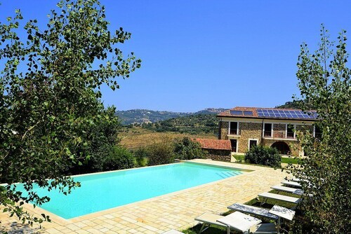 Villa Nefele: A spacious and welcoming two-story villa in a quiet position, located on a hillside above the sea, with Free WI-FI.