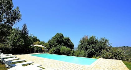 Villa Nefele: A spacious and welcoming two-story villa in a quiet position, located on a hillside above the sea, with Free WI-FI.