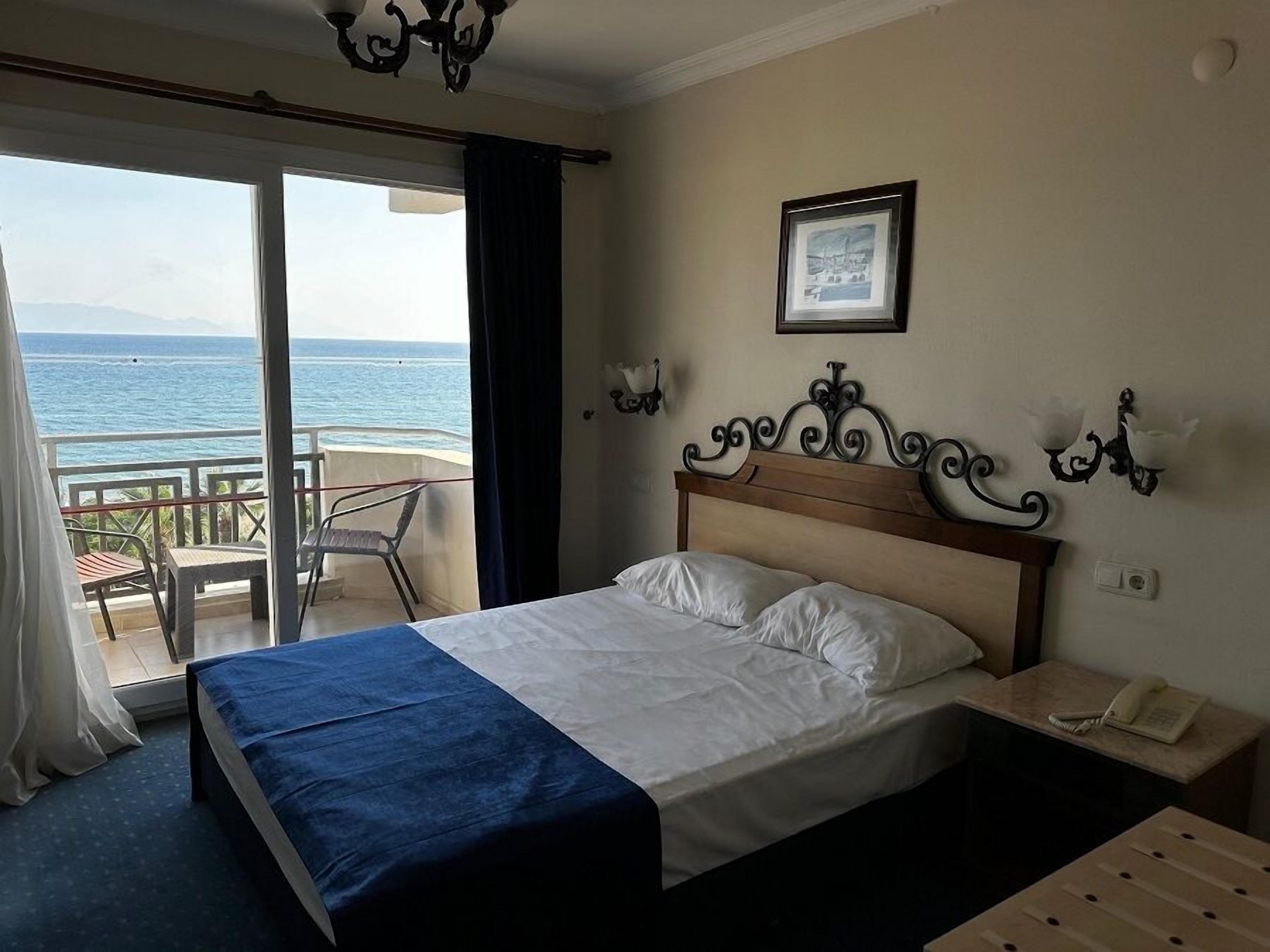 Standard-Doppel- oder -Zweibettzimmer, Balkon, Meerblick | Minibar, kostenloses WLAN, Bettwäsche