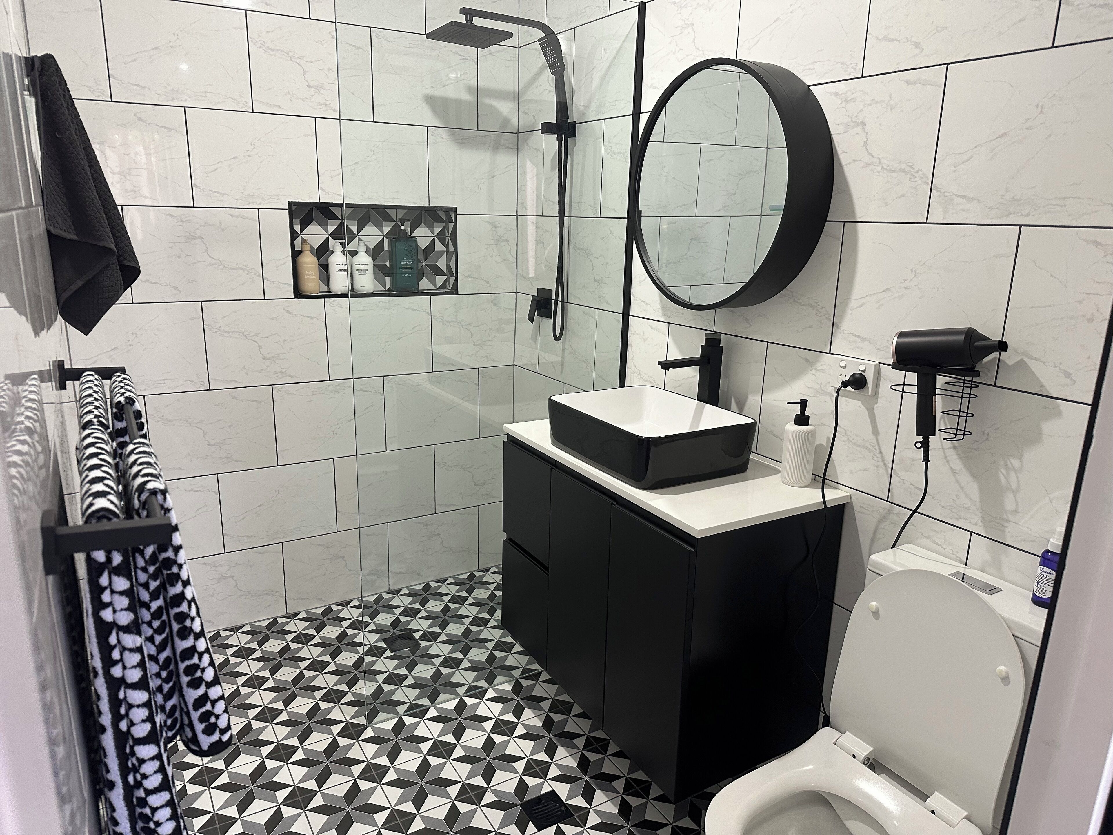 Shower, hair dryer, towels, soap