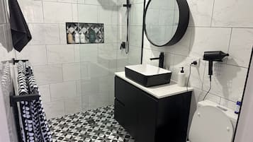 Shower, hair dryer, towels, soap