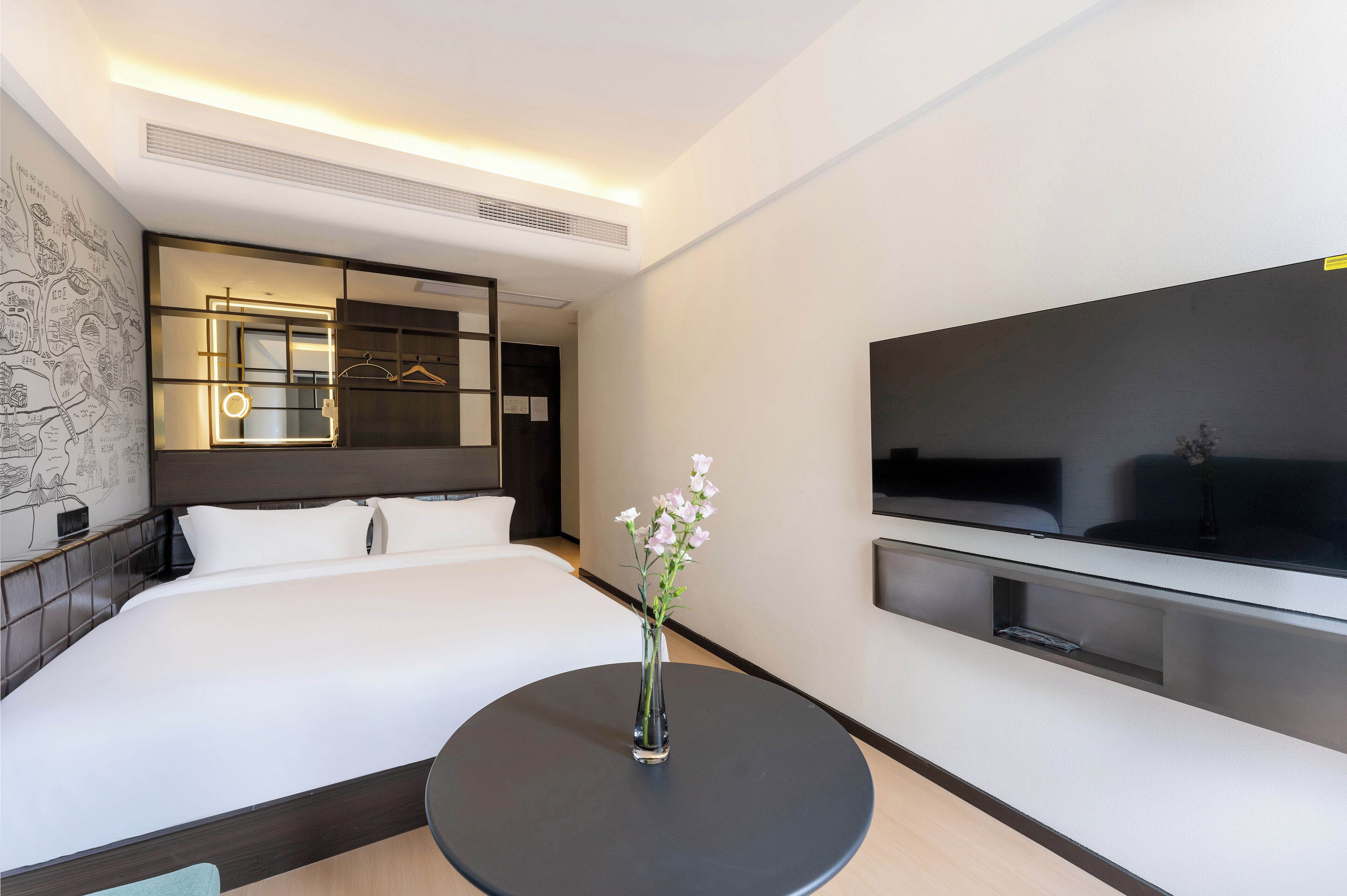Habitación individual básica | Camas con pillow-top y caja de seguridad en la habitación 