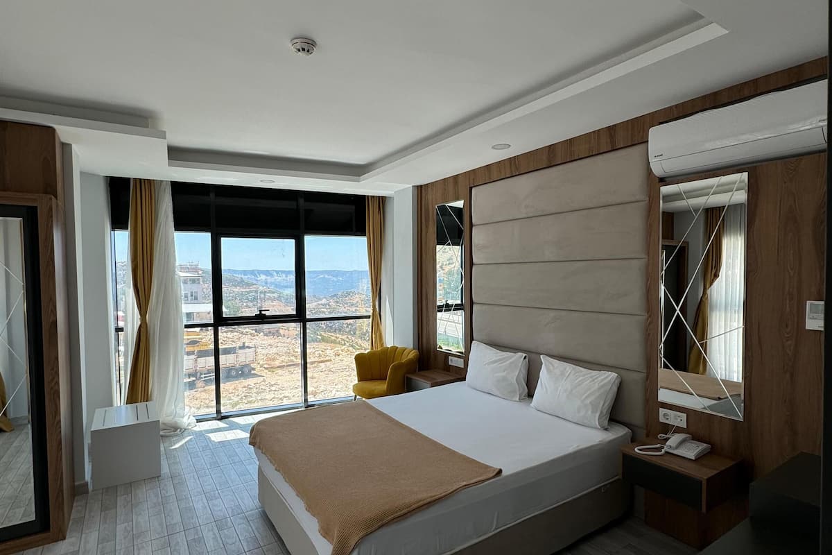 Luxury Suite, Mountain View | Laptop workspace, iron/ironing board, free WiFi