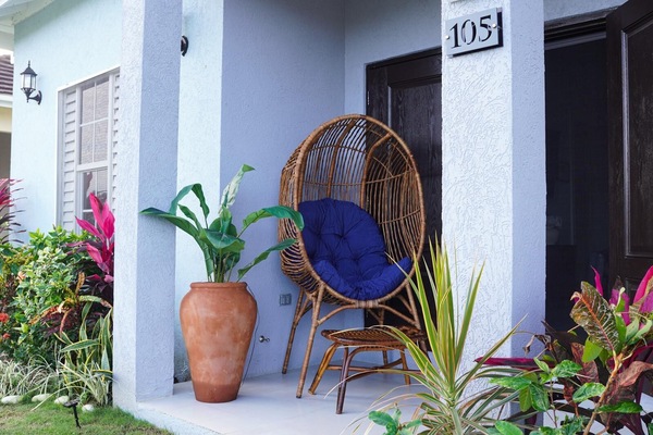 Front patio, with gorgeous bespoke egg chair, perfect for relaxing with a drink.