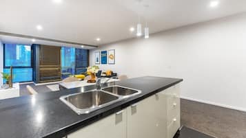 Apartment, 3 Bedrooms | Private kitchenette | Full-size fridge, microwave, oven, stovetop