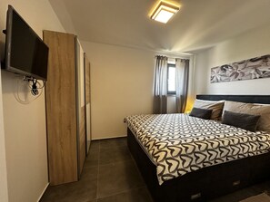 3 dormitorios, tabla de planchar con plancha, wifi gratis y ropa de cama