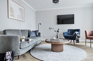 Sauna Wellness Suite mit Terrasse | Area keluarga | TV layar datar, Netflix, lantai berpemanas, dan layanan streaming