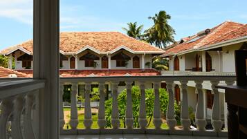 Premium bedding, desk, laptop workspace, soundproofing