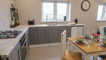 Fridge, oven, dishwasher, high chair