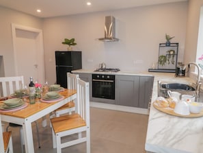 Fridge, oven, dishwasher, high chair
