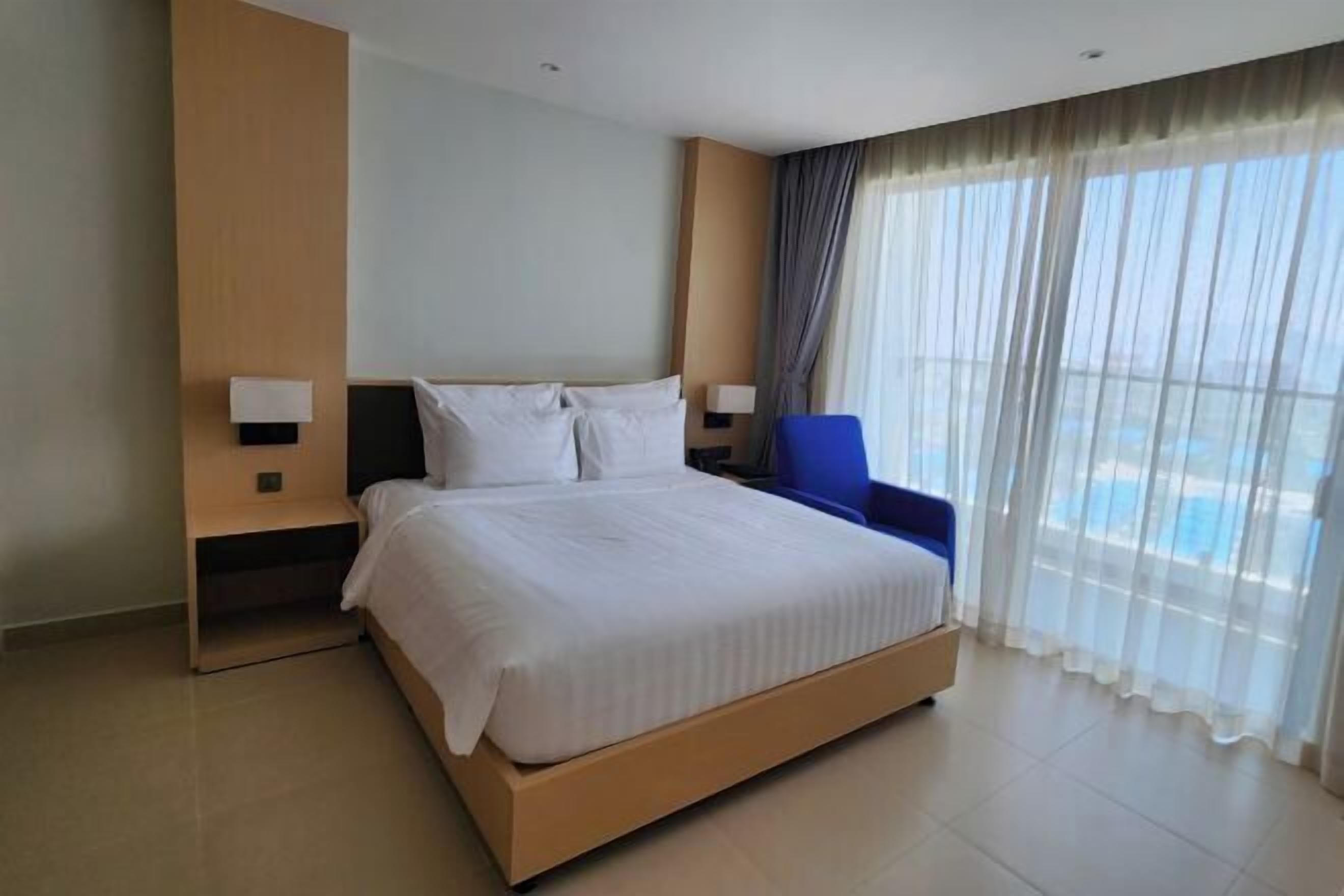 Desk, laptop workspace, blackout curtains, free WiFi