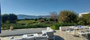 Outdoor dining - Beachfront Villa close to Kite Surf with BBQ, Garden and Seaview (Paros)