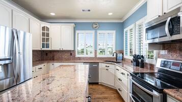 Fridge, microwave, dishwasher, coffee/tea maker