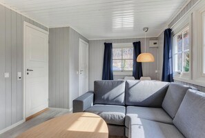 Comfort Cabin, Patio, Partial Sea View | Living area