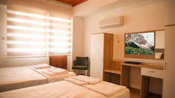 Family Triple Room, Balcony, Lake View | Desk, free WiFi