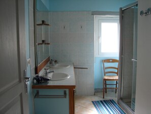 Shower, hair dryer, soap, shampoo
