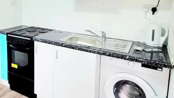 Fridge, microwave, oven, cookware/dishes/utensils