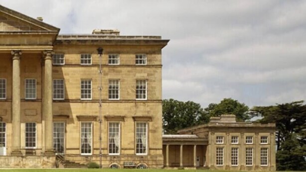 A large, stately building with a symmetrical facade, multiple windows, and a central entrance with columns. - 2 bedroom home within walking distance of the town - Pass the Keys (Shrewsbury)