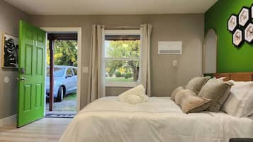 Iron/ironing board, travel crib, free WiFi, bed sheets