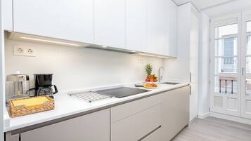 Superior Apartment, 3 Bedrooms | Private kitchen | Full-sized fridge, microwave, oven, stovetop