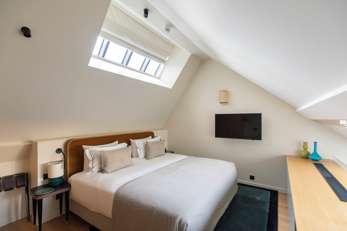 Résidence Duplex | Minibar, in-room safe, desk, laptop workspace