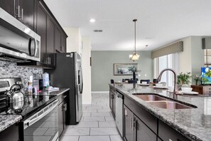 Fridge, microwave, oven, dishwasher - New Storey Lake 4 Bedroom Townhome With Pool (Kissimmee)