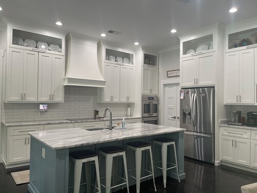 Quiet, secluded 4 bedroom home with large pool.