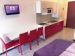 Iron/ironing board, travel crib, free WiFi, bed sheets