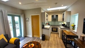 Fridge, microwave, oven, electric kettle - Acorn Cottage within easy reach of West Cornwall and the Lizard peninsular. (Crowntown)