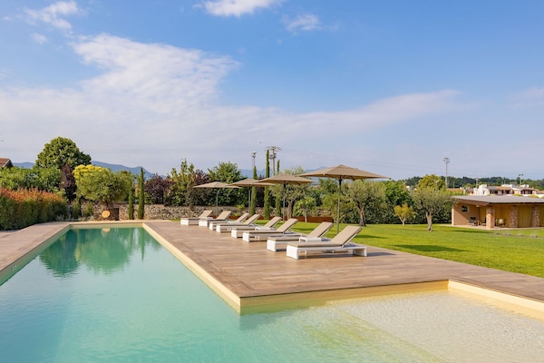 Activities, Amenities, Balcony / Terrace / Patio, Building Exterior, Golf, Pool, Spring, Summer, Wellness