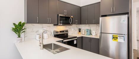 Fridge, microwave, oven, stovetop