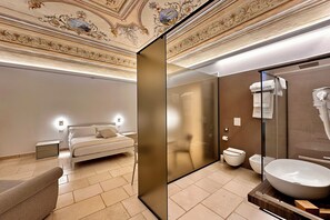 Shower, jetted tub, eco-friendly toiletries, hair dryer
