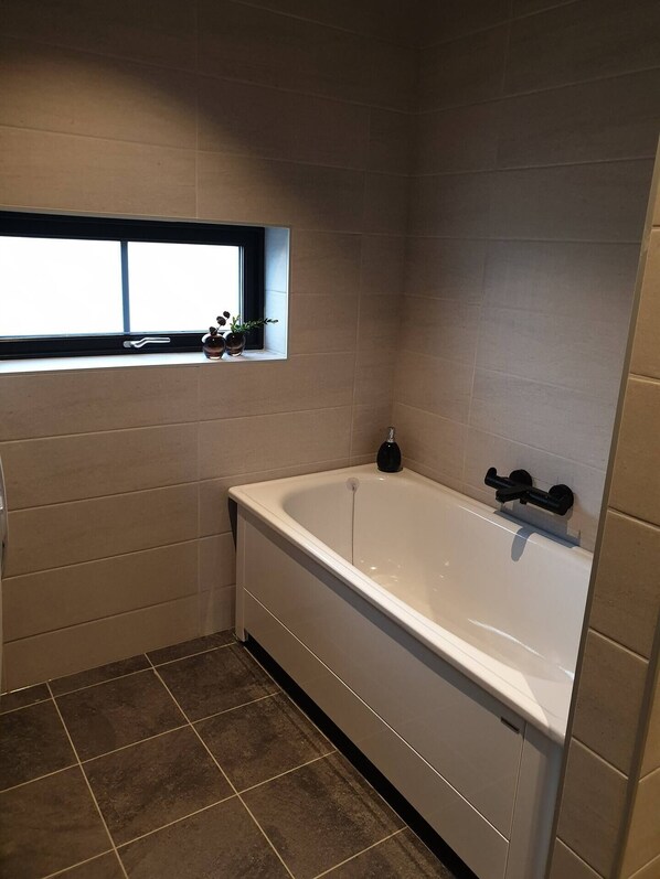 Shower, towels, toilet paper