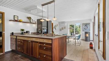 Fridge, stovetop, dishwasher, coffee/tea maker
