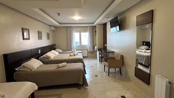 Family Room, City View | Soundproofing, free WiFi