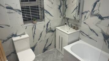 Hair dryer, towels, soap, shampoo