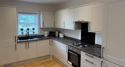 New built semi detached house on canal
