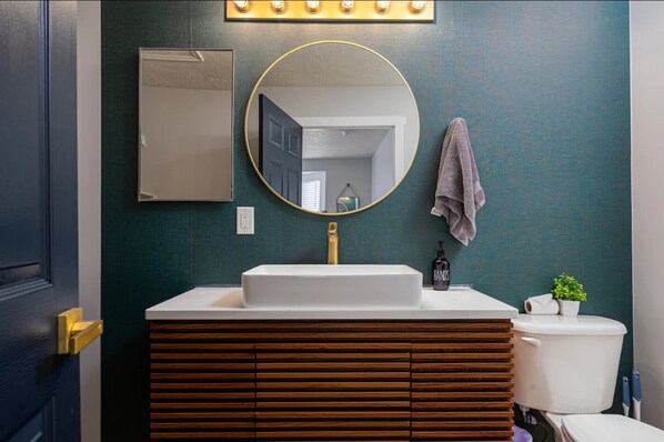 Hair dryer, towels, soap, toilet paper