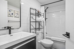 Hair dryer, towels, soap, shampoo